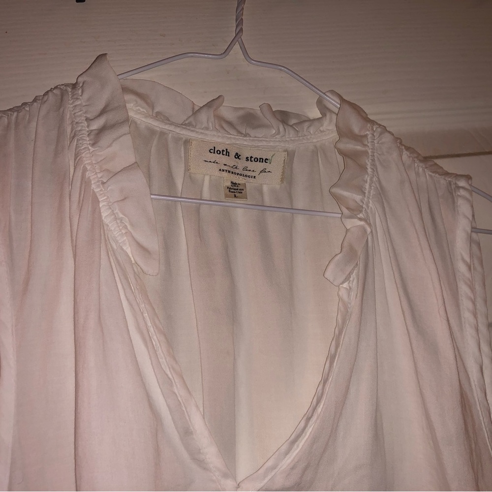 Sleeveless white blouse